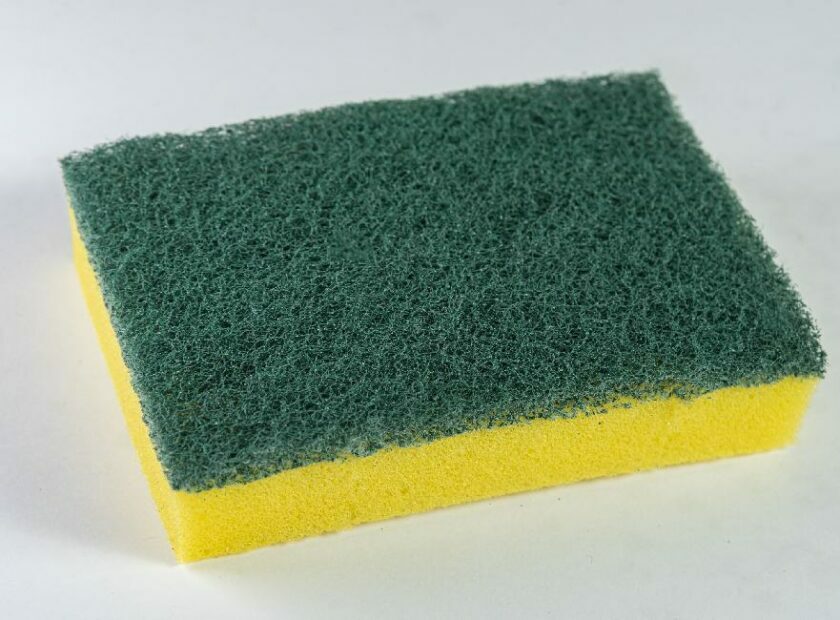 Kitchen sponge on the white background